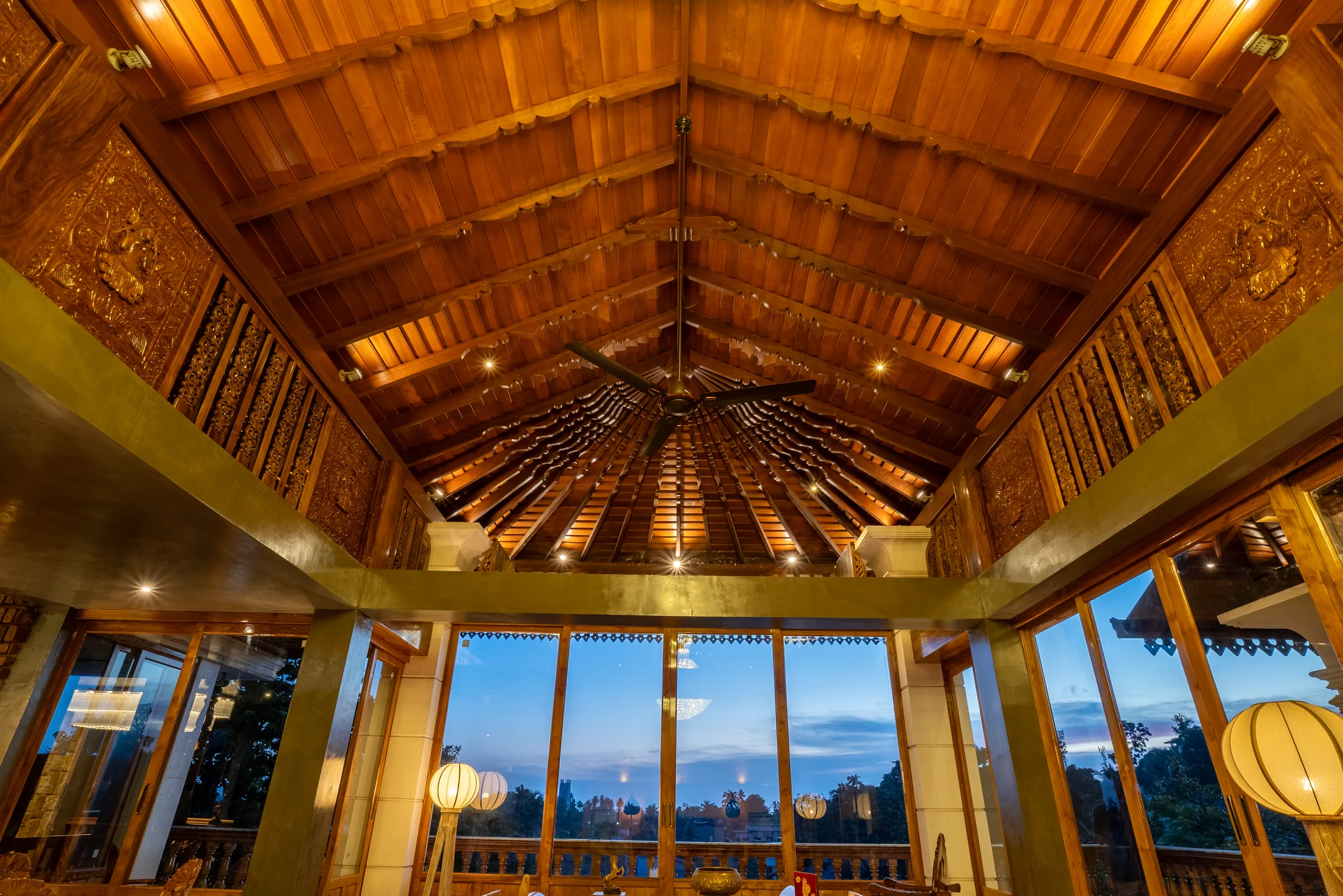 Open-plan living space beneath RedKing's dramatic timber ceiling